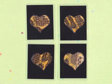 A lucky charm of the skin of the habu made in the Tokunoshima island : Gold heart