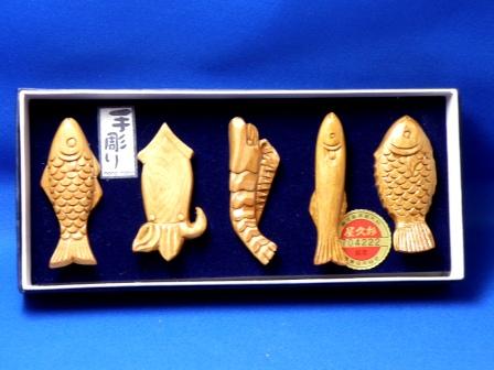 A chopstick rest set carved by hands A fish shop