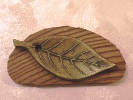 A Yakusugi incense stand Leaf