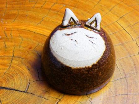 A globular sake cup Funny Cat