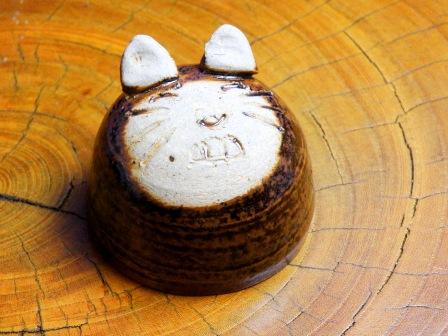 A globular sake cup Funny Cat