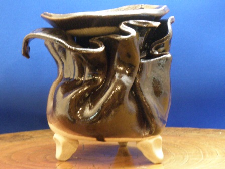 A black incense burner for green tea leaves