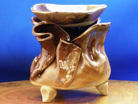 A brown incense burner for green tea leaves