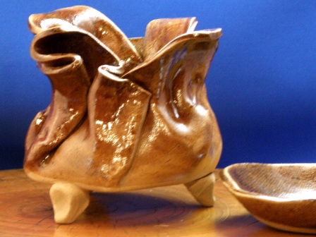 A brown incense burner for green tea leaves